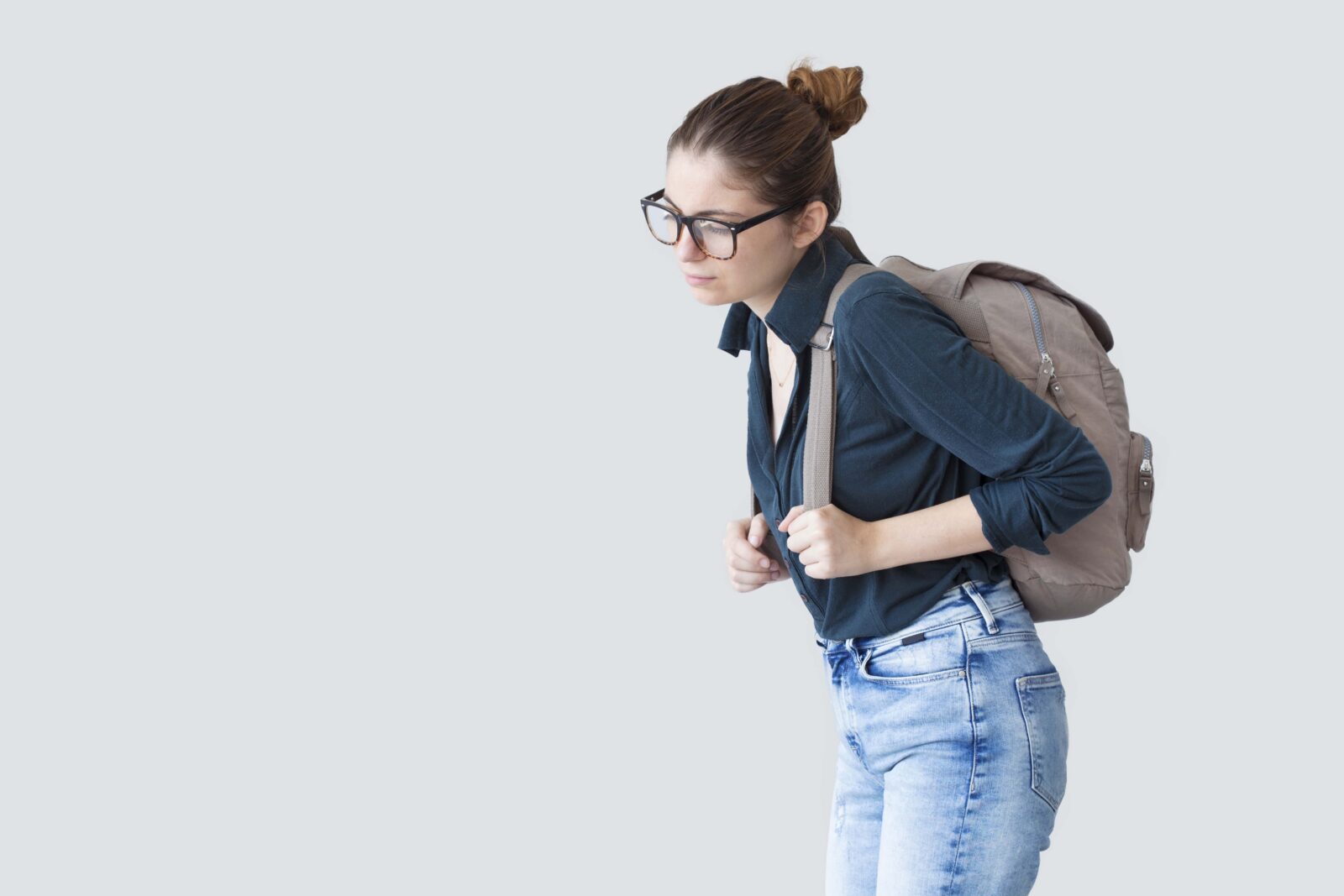 woman walking with large backpack
