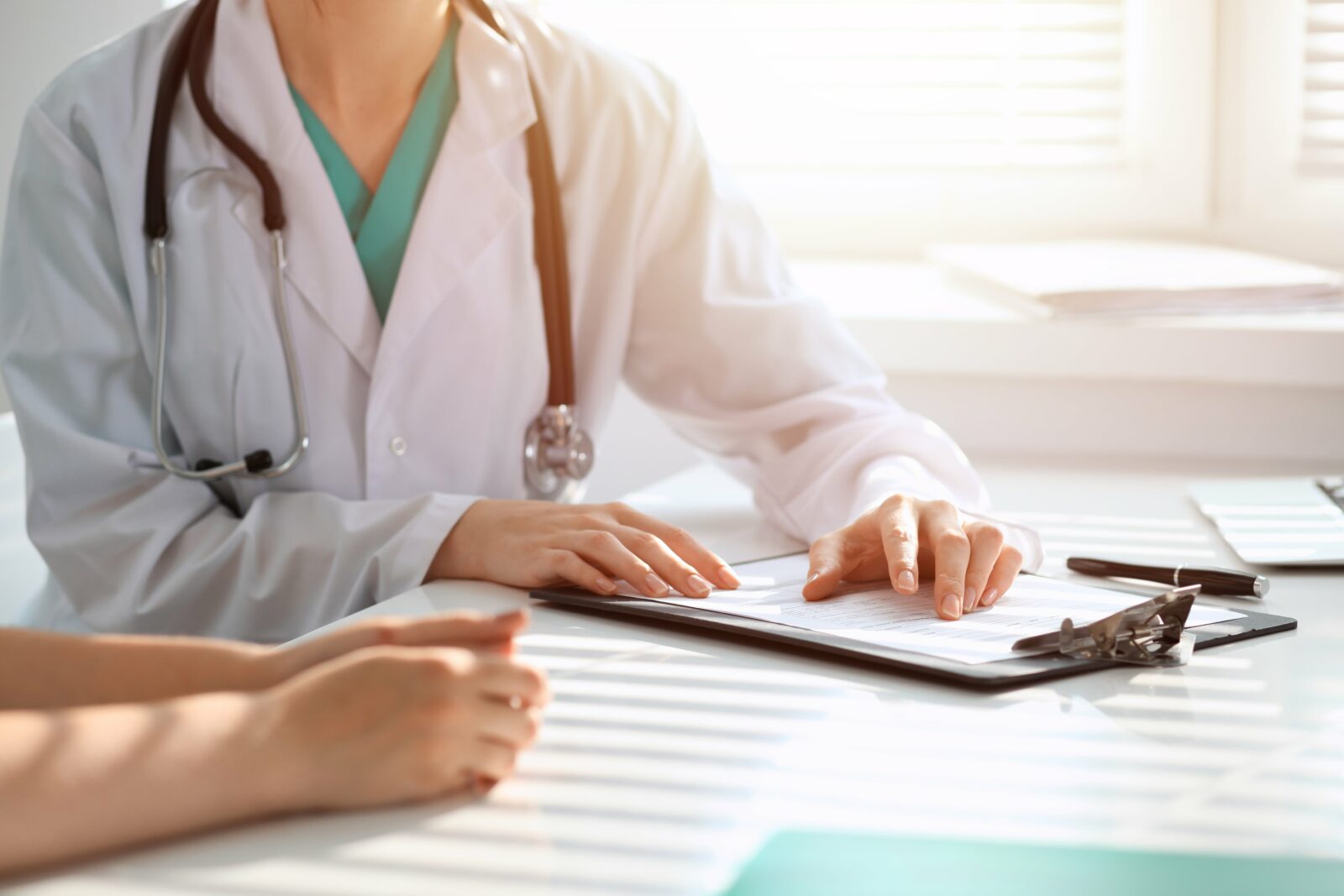 patient speaking with doctor