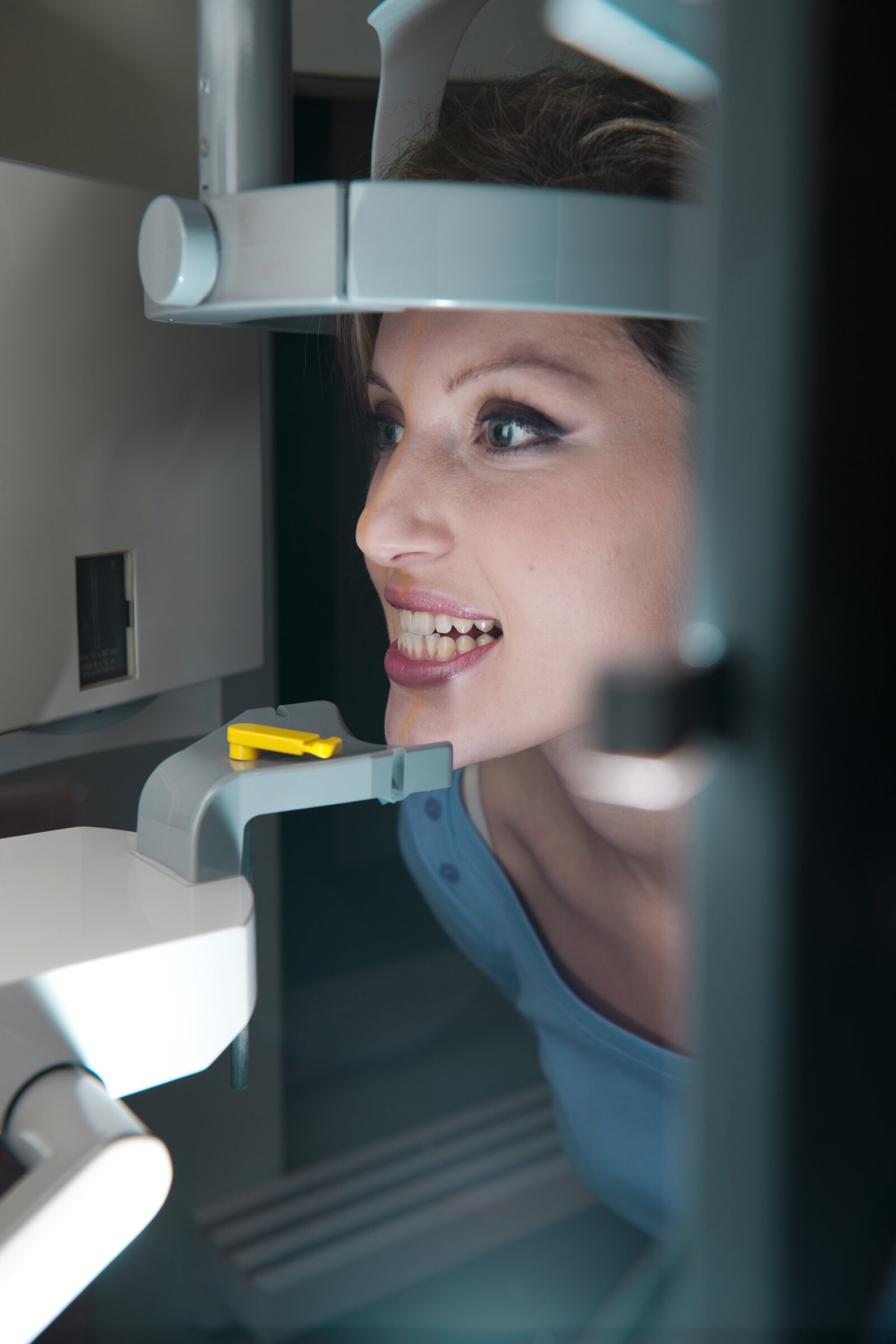woman having a dental x-ray performed