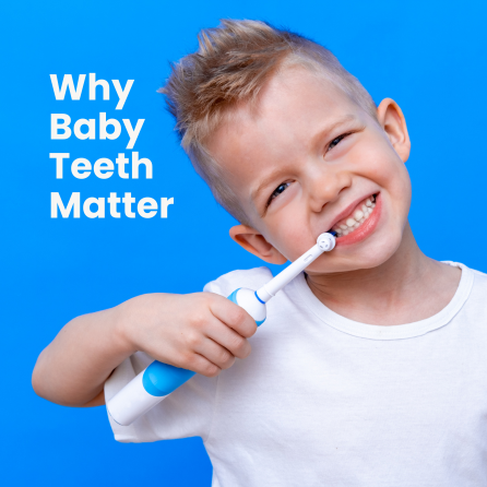 A child wearing a white t-shirt brushes their teeth with an electric toothbrush against a bright blue background.