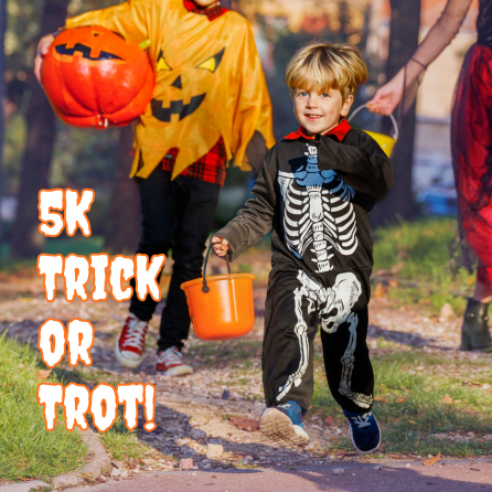 Child in skeleton onesie holding a Halloween basket runs while looking at the camera