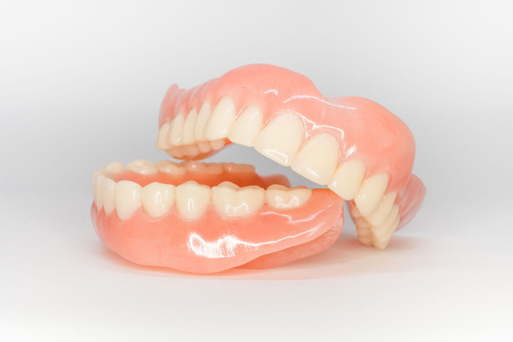 set of dentures on isolated background