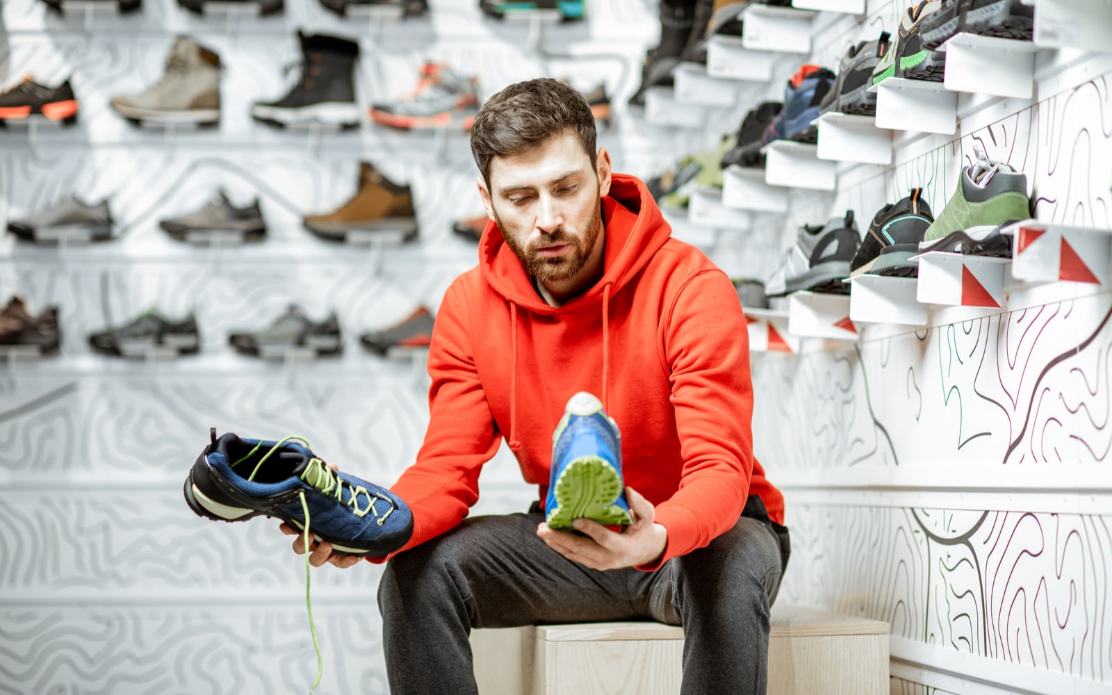 Man trying to select a shoe