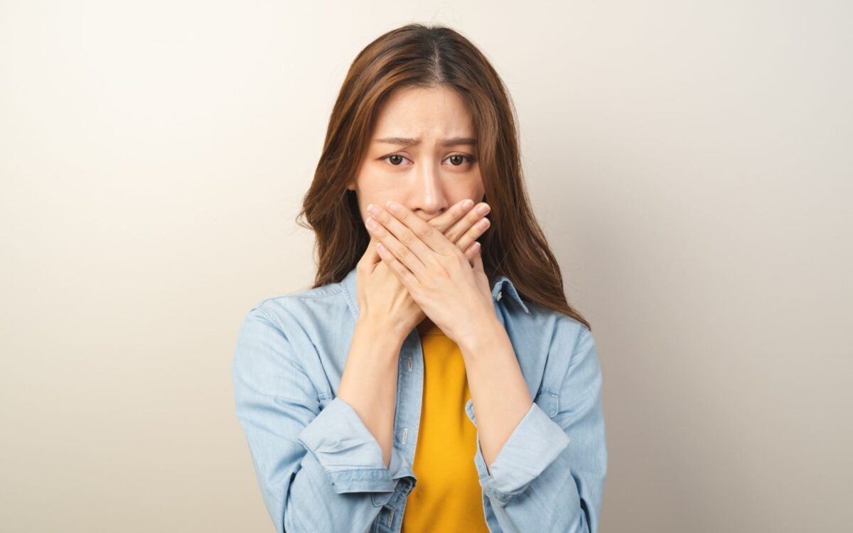Woman experiencing bad breath
