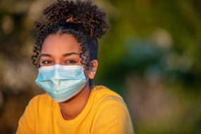 woman in disposable mask