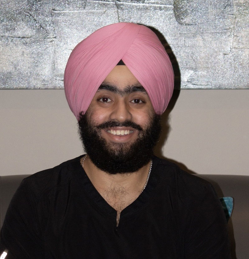 Gurbaksh showing the concept of Our Team