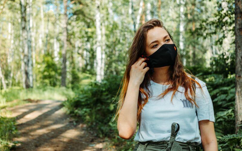 Woman hiking with mask