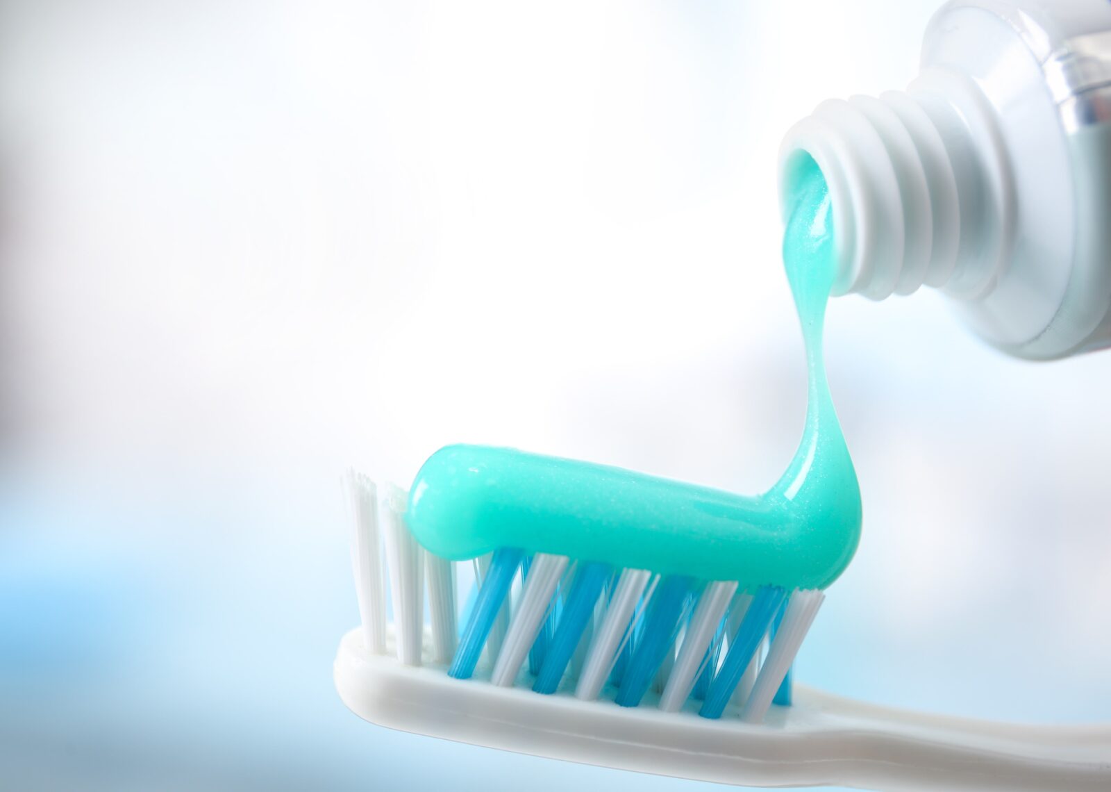 toothpaste on toothbrush