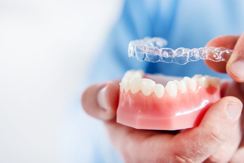 invisalign treatment, invisalign clear aligners, invisalign orthodontics troy, invisalign clear teeth aligners