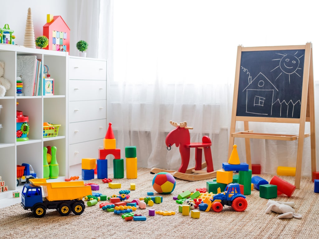 Children's playroom with plastic colorful educational blocks toys.