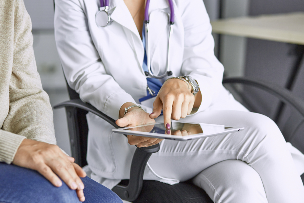 Doctor talking to patient about Bioidentical Hormone Replacement Therapy