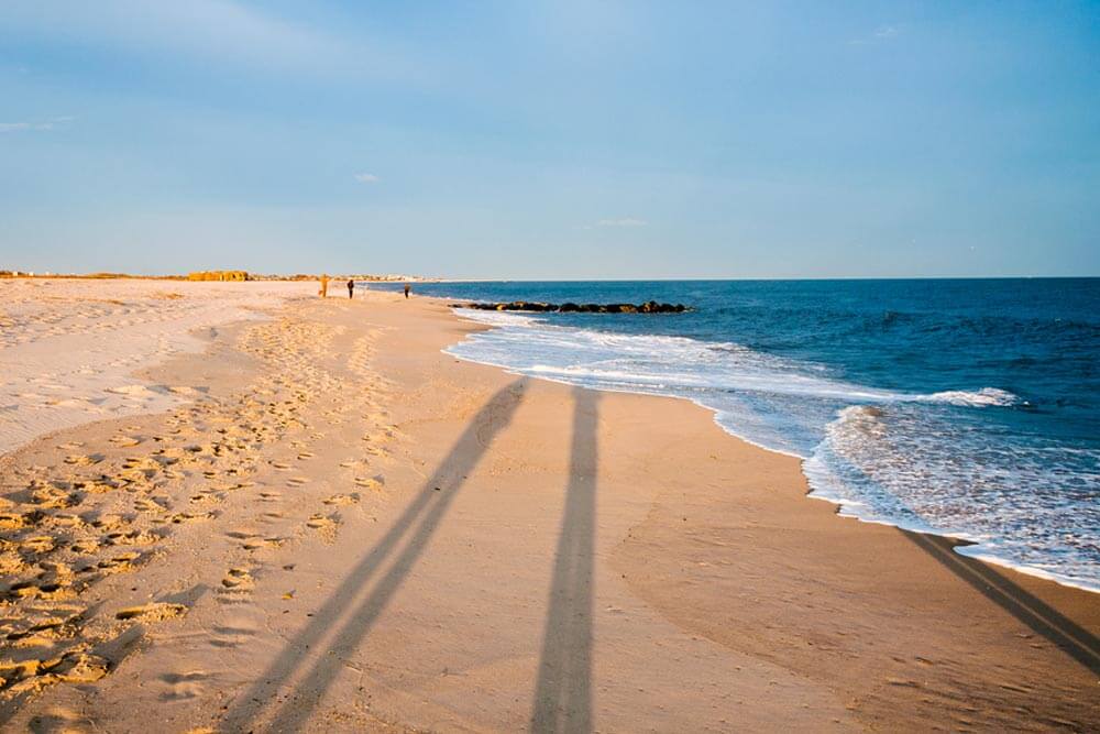 Long evening shadows on the beach at Cape May