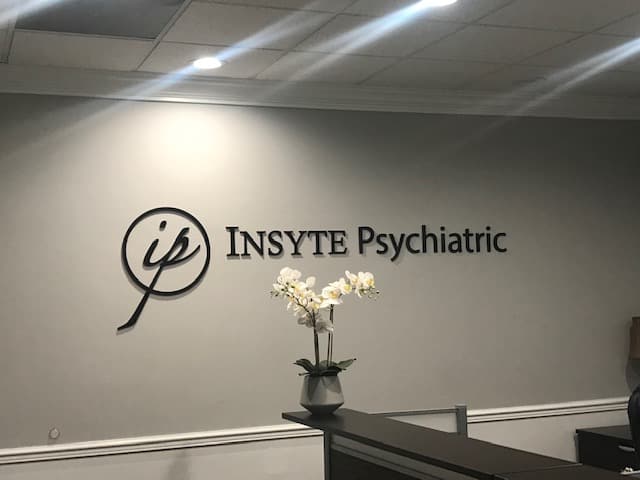 office reception with insytep sychiatric logo on wall
