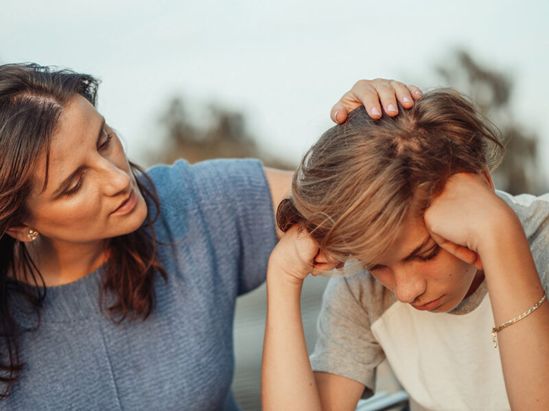 Parent talking to child about mental health