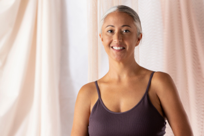 Patient discussing awake tummy tuck consultation and surgical planning with a cosmetic surgeon