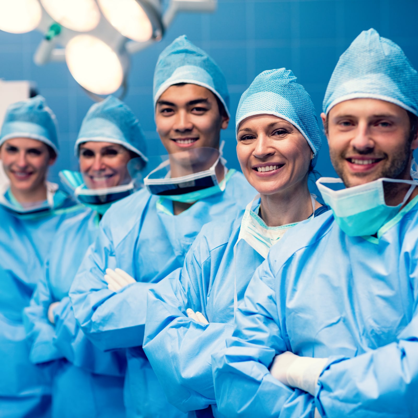 surgeons standing in operation room