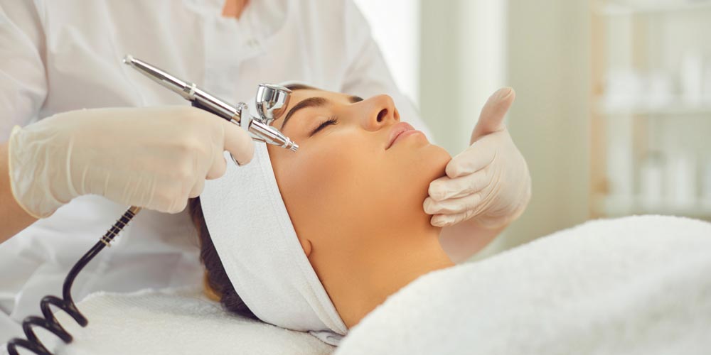 woman receiving facials are part of Spa Services