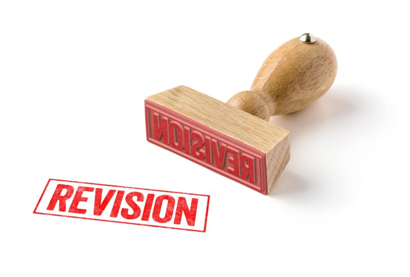 A rubber stamp on a white background - Revision