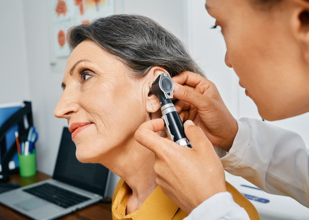 Hearing test for mature people, otoscopy