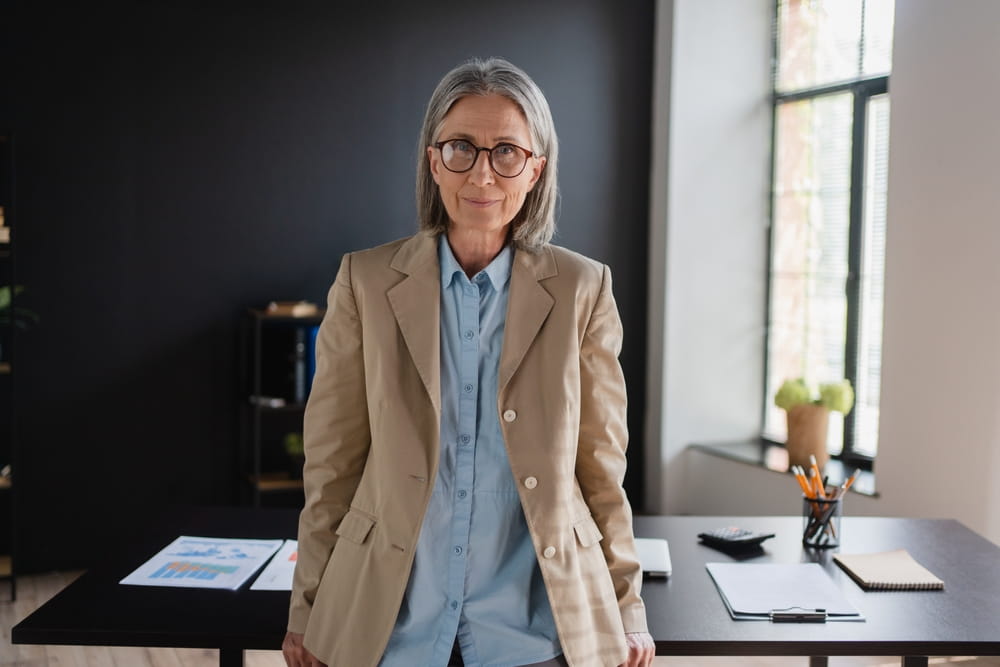Confident mature business woman 50 years old lady entrepreneur,