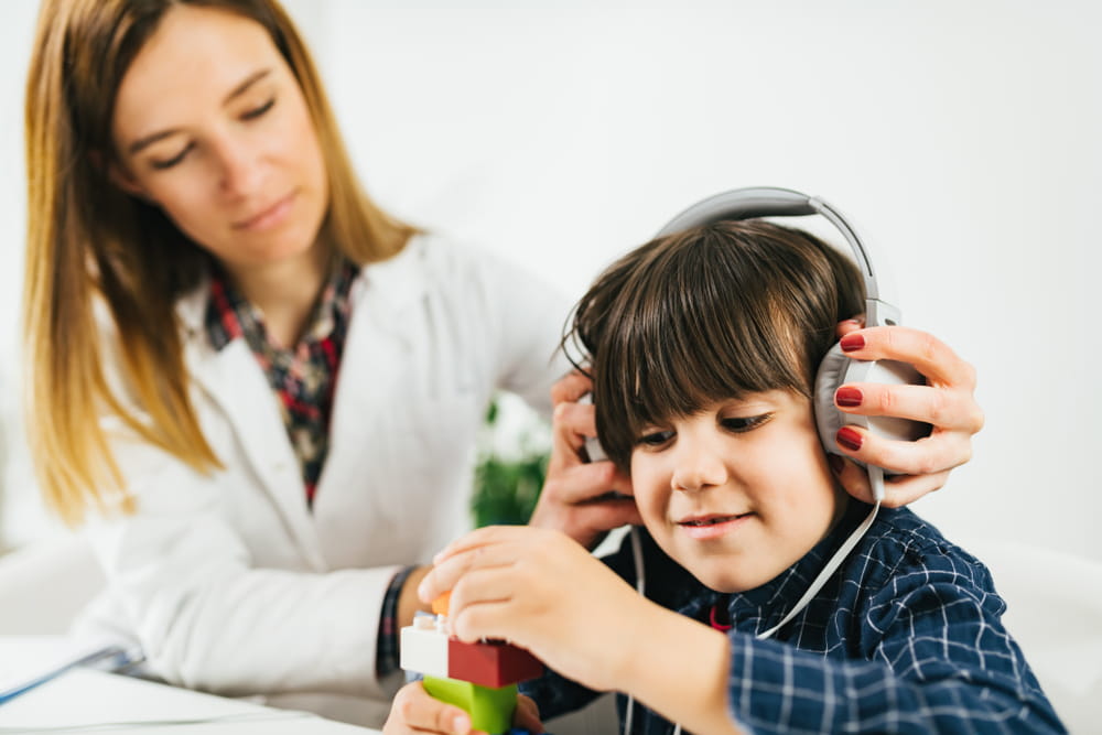 Boy Having a Hearing Exam in the Audiologist's Office