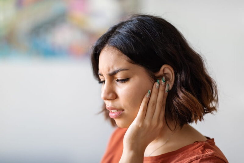 Ears Pain. Sick Young Arab Woman Suffering From Earache At Home,