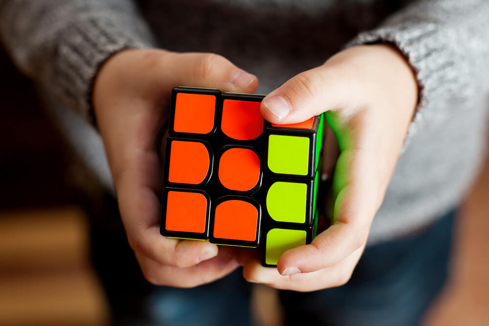 Rubik's cube in the hands of a child