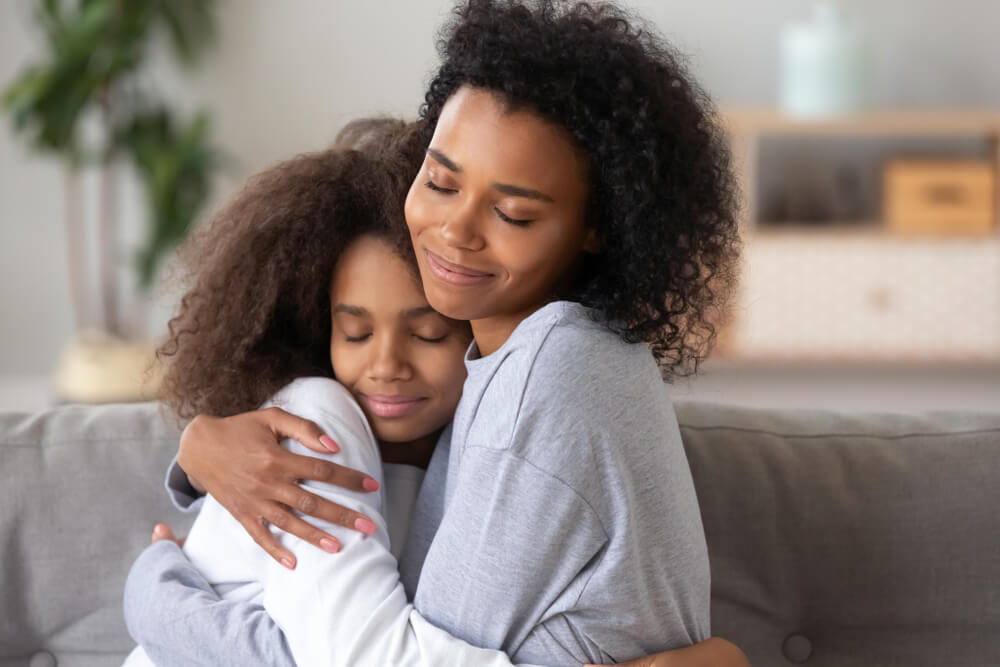 mother and teenage daughter enjoying moment together