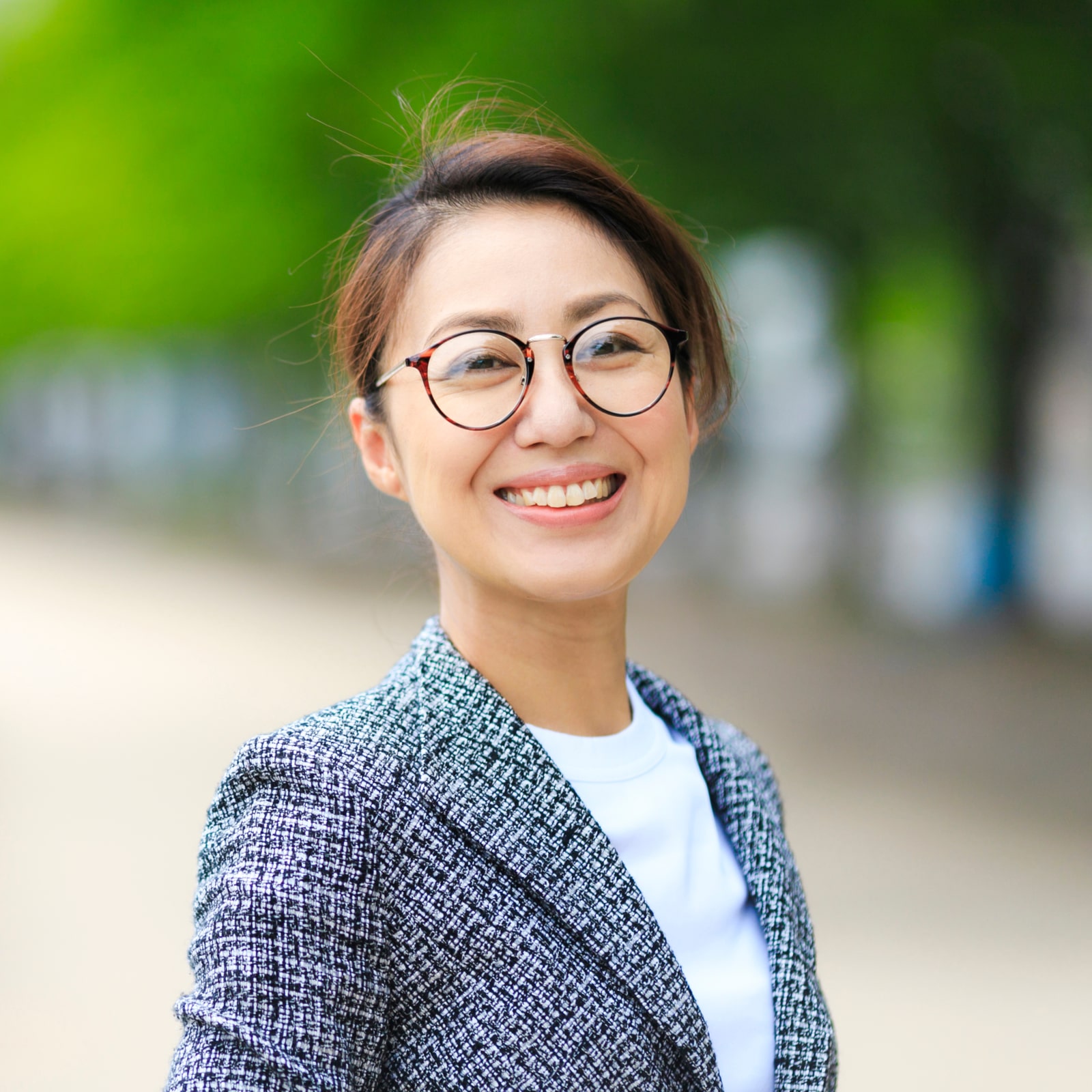 smiling young women with glasses