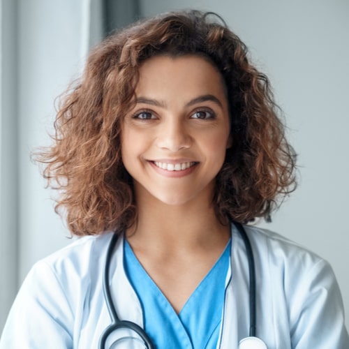 happy young female doctor wear blue uniform