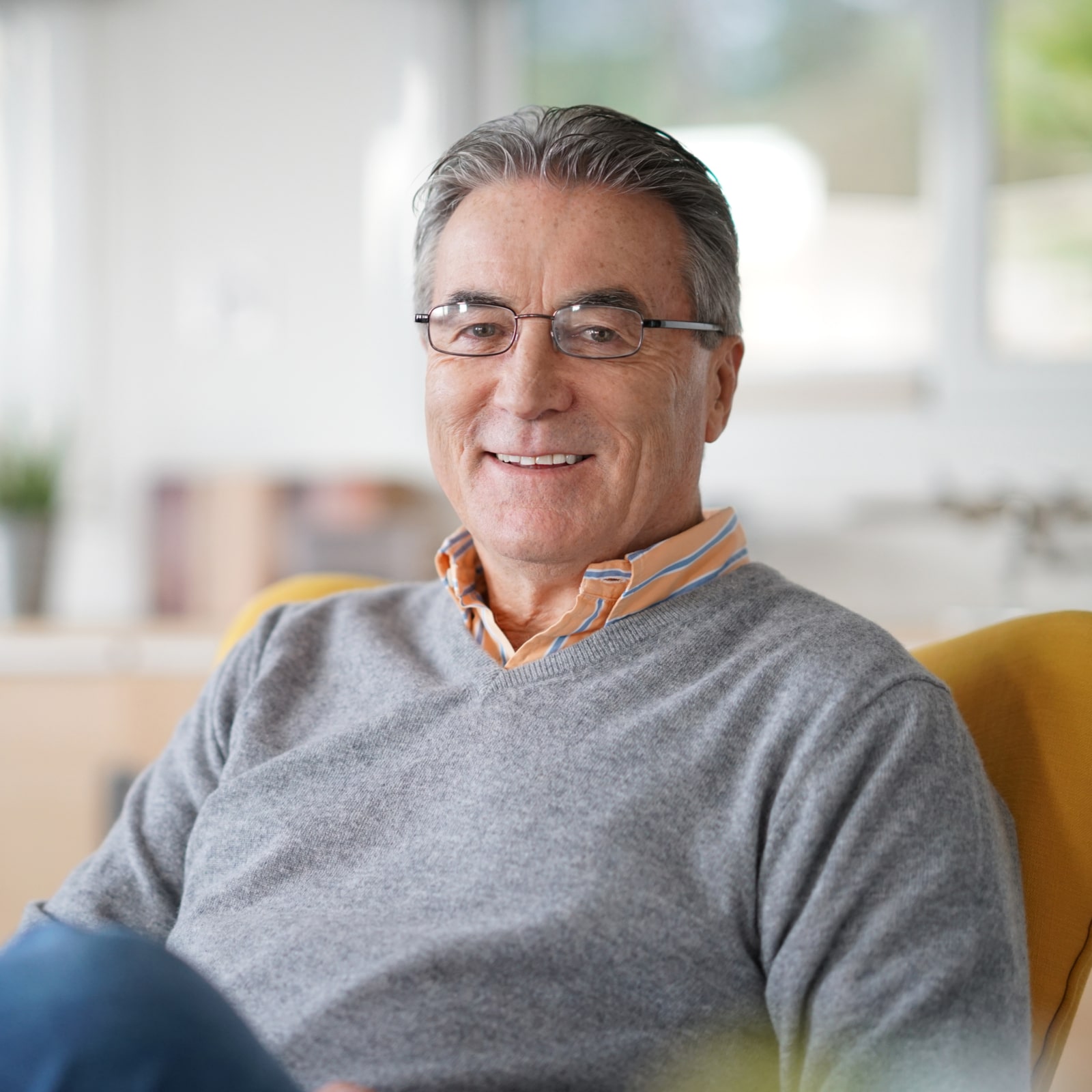 Smiling senior man with eyeglasses