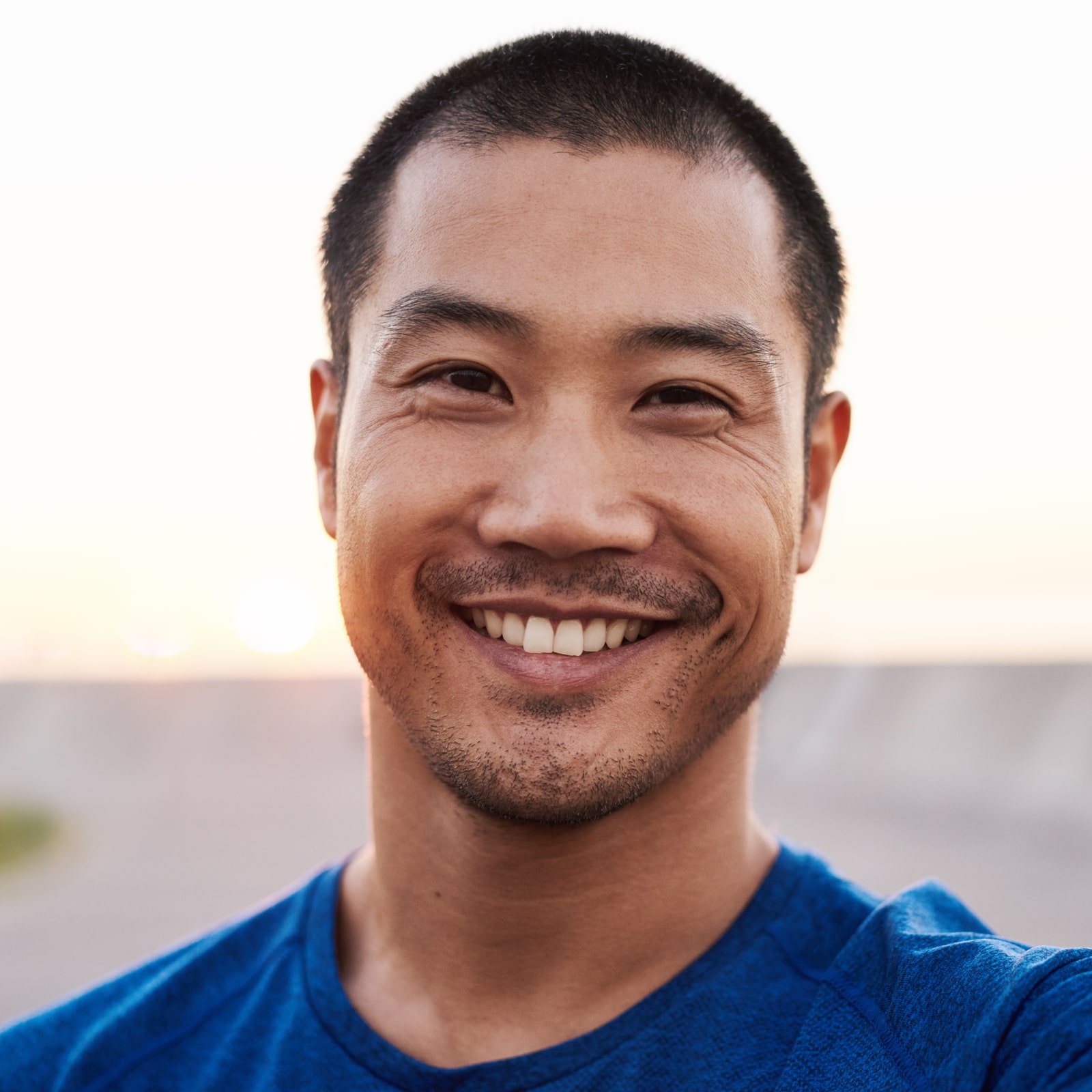 man in sportswear taking a selfie