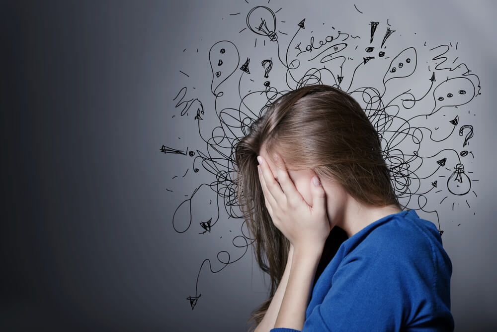 Sad young man with worried stressed face expression