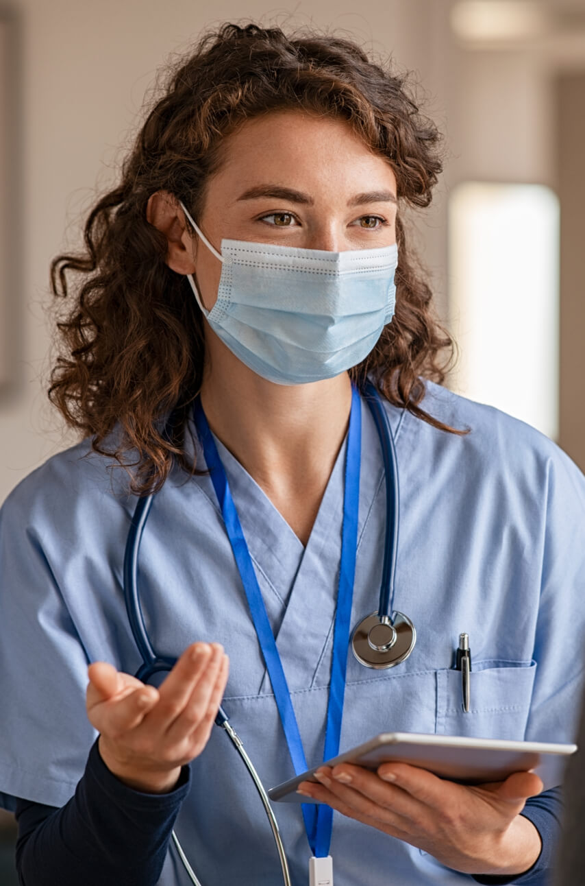 Nurse holding Tablet Talking with some one