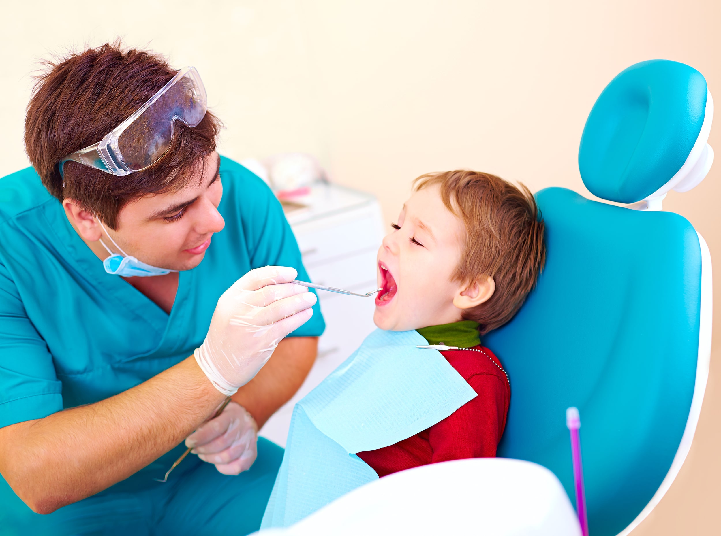 young boy having a dental exam