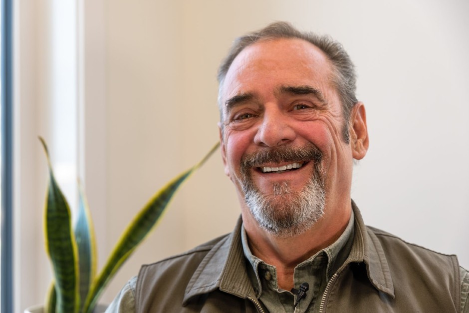 smiling patient after visiting our dentist in Beaverlodge, Alberta.