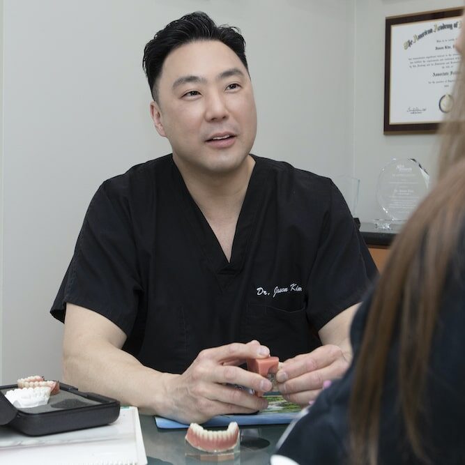 Dr. Jason Kim with patient