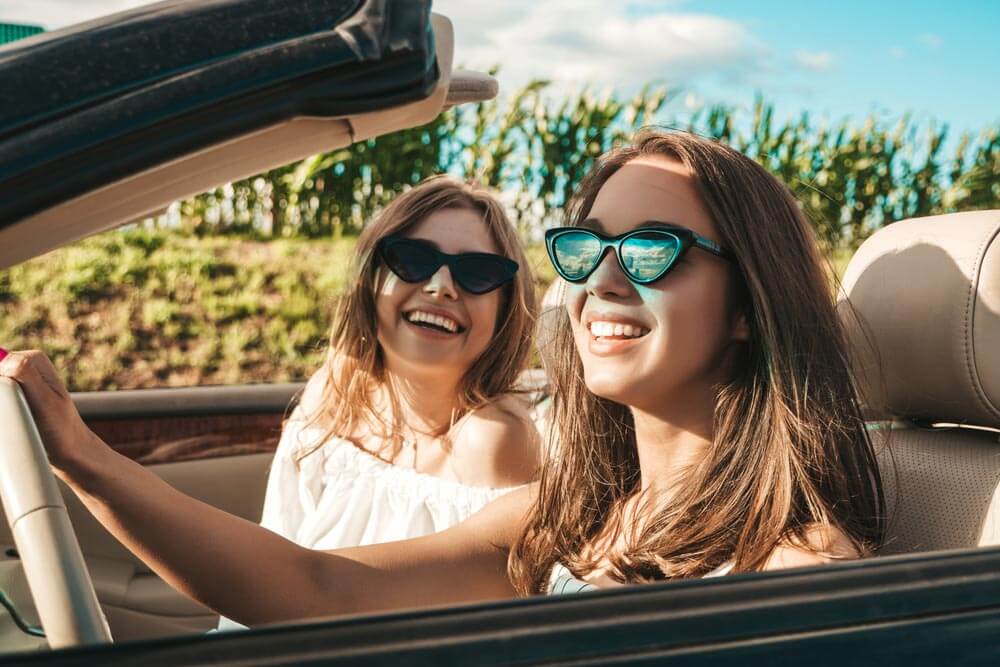 two young beautiful and smiling hipster female