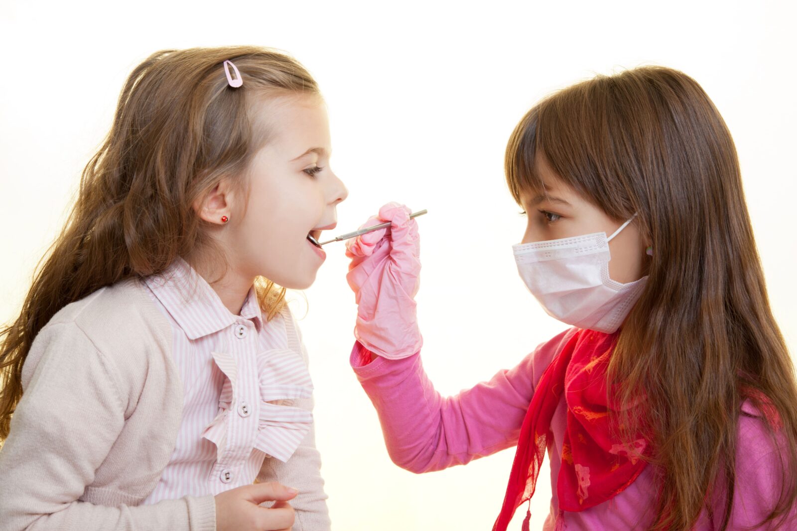 girls playing dentist