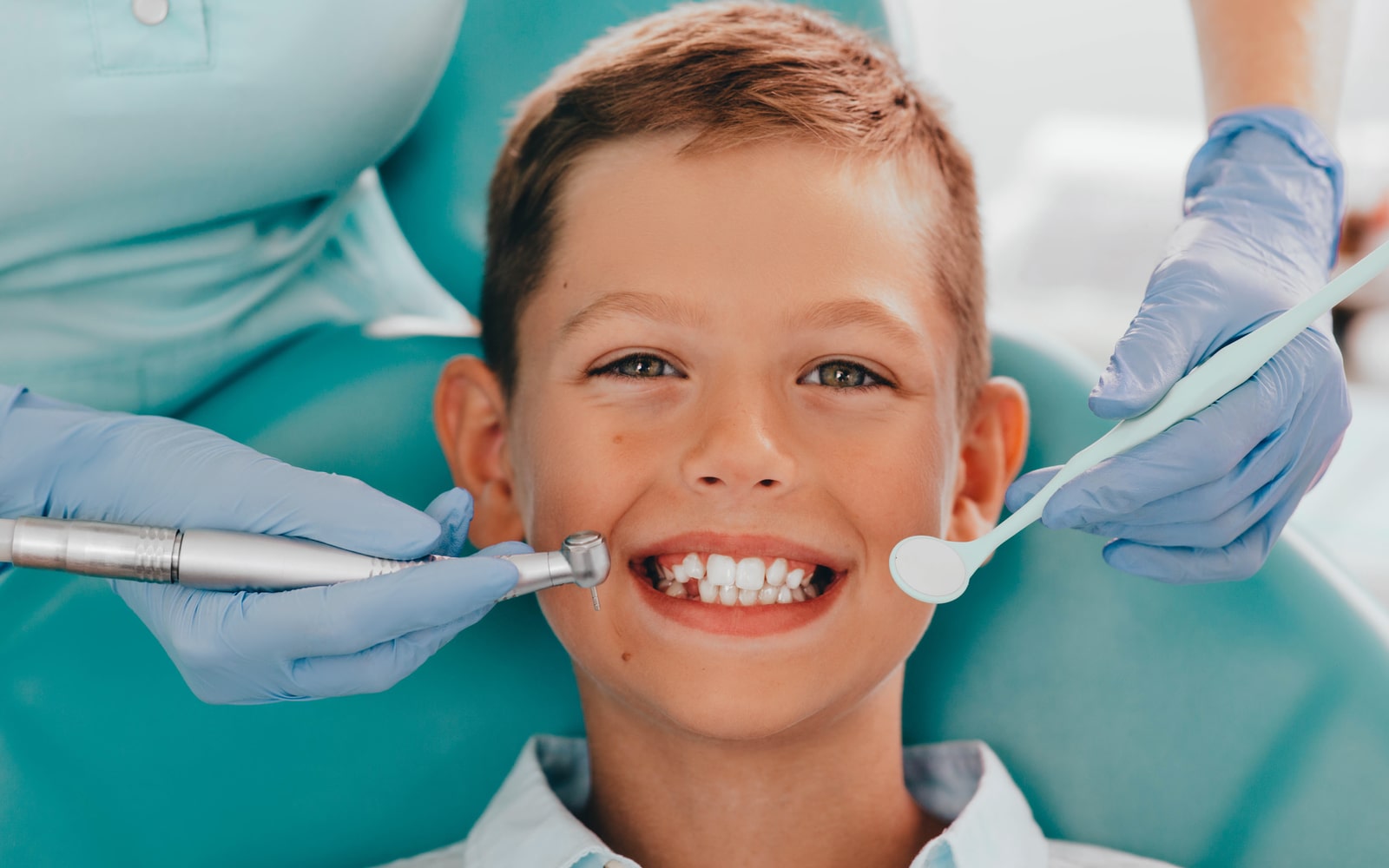 Smiling Boy Receiving Treatment