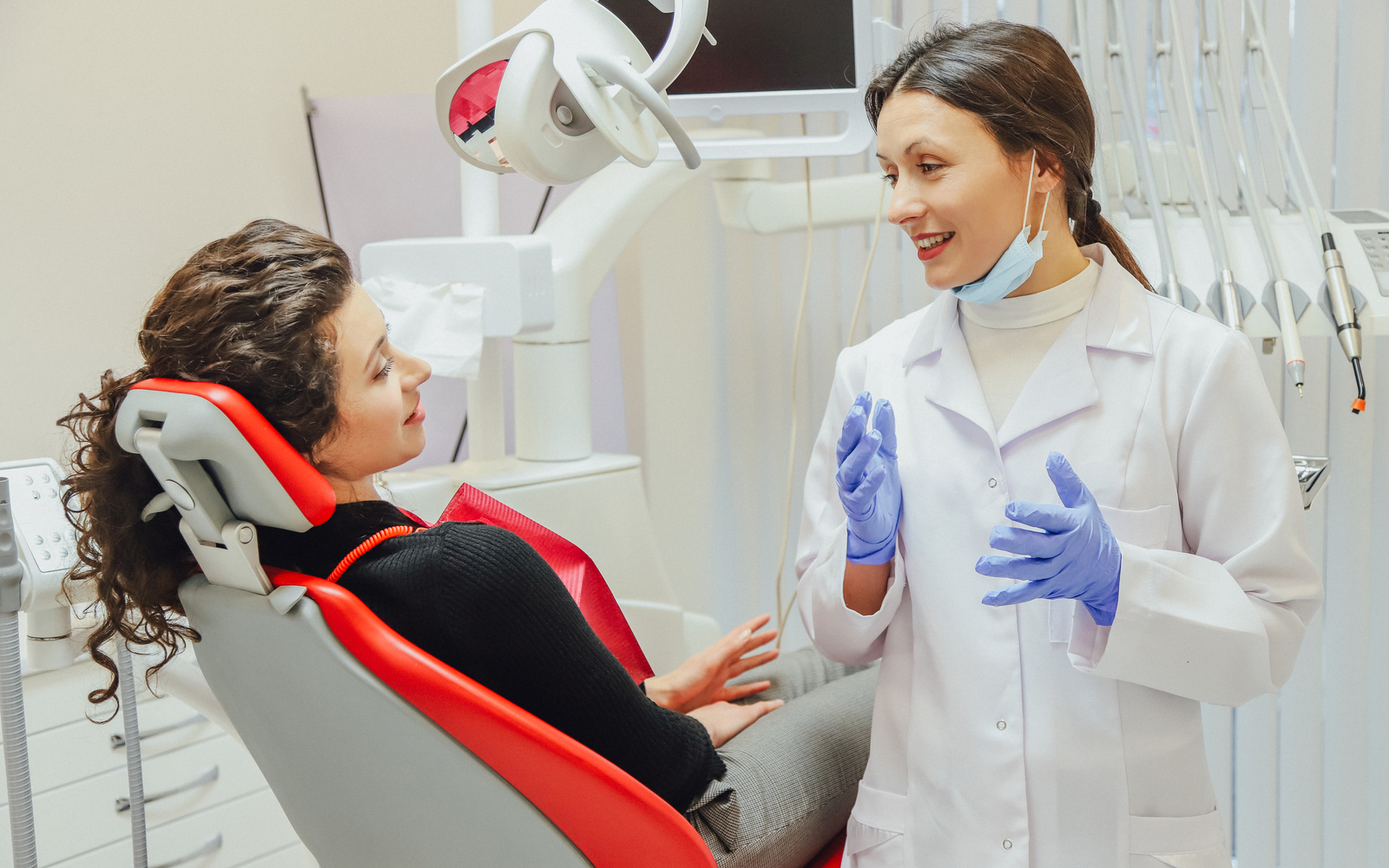 Woman Sitting in Dental Chair