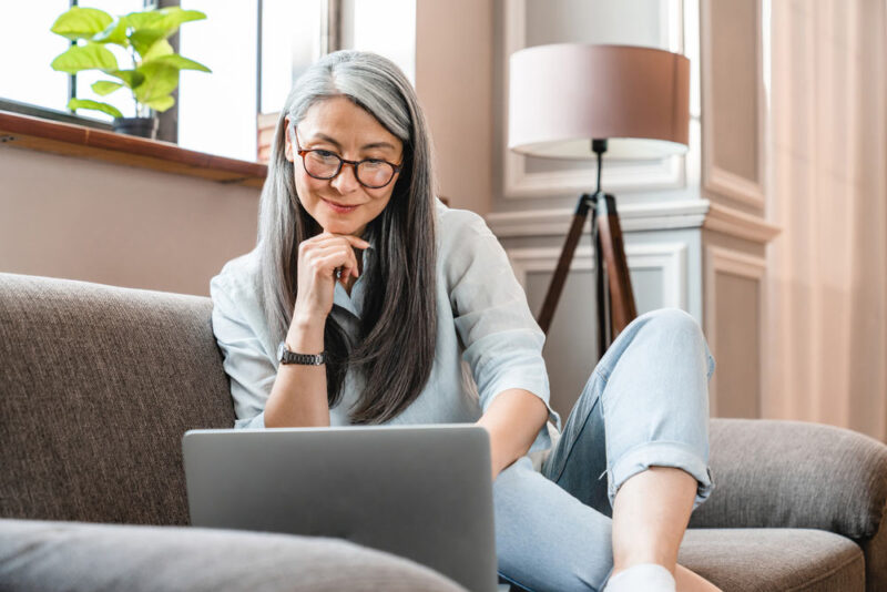 mature woman working on laptop