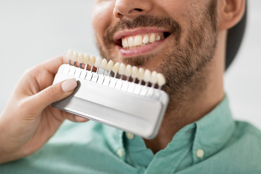 A man at the dentist receiving Dental Veneers