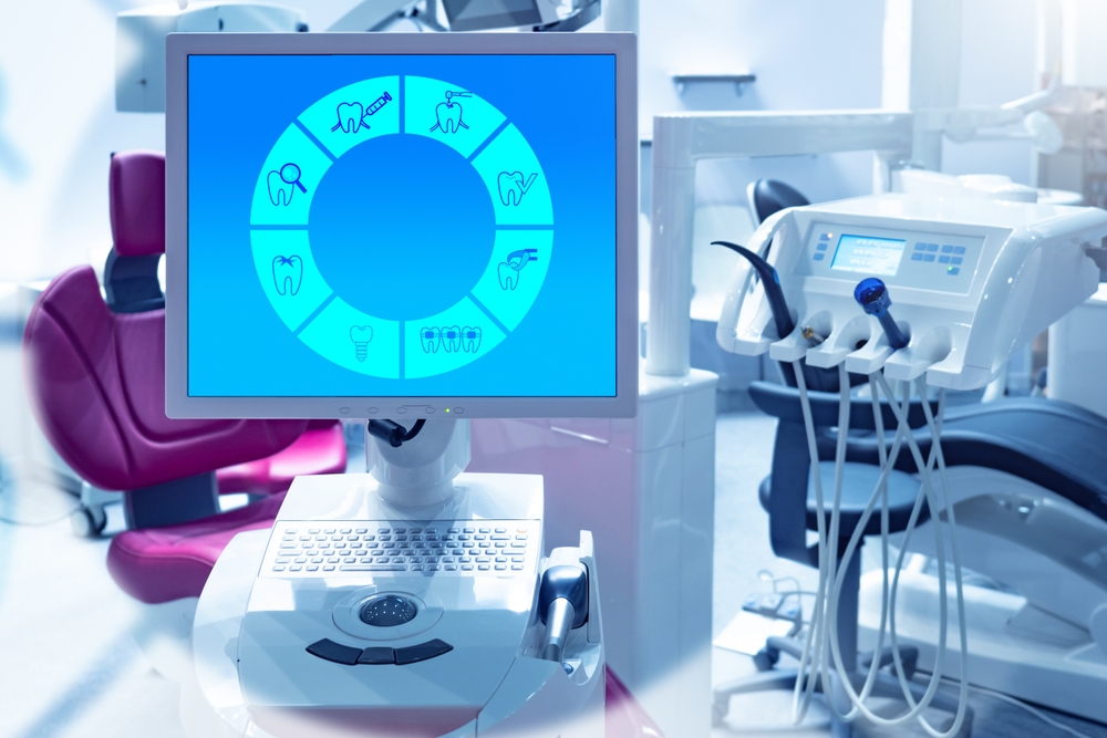 Dentist equipment. Orthodontist computer. Monitor with teeth icons. Dental technologies