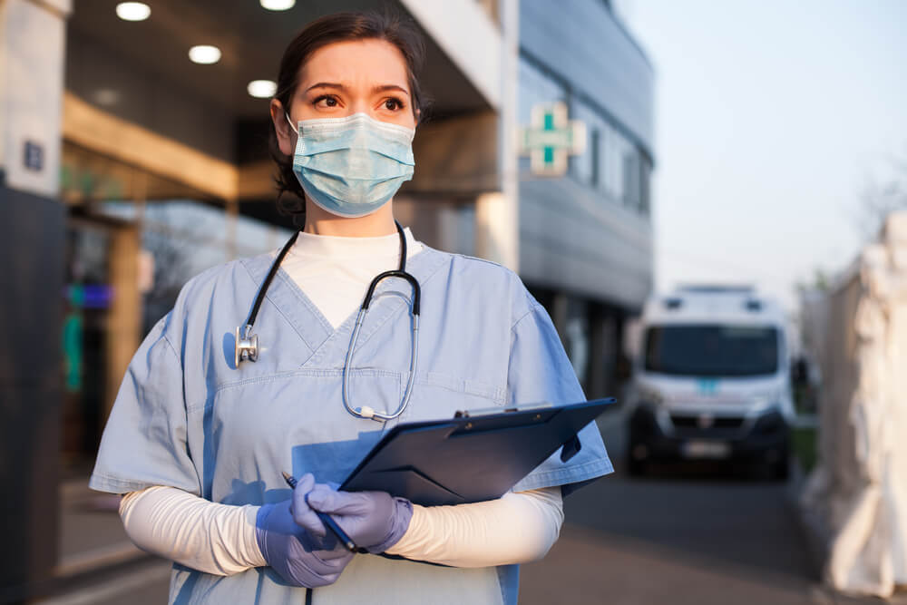 Young female doctor in front of healthcare