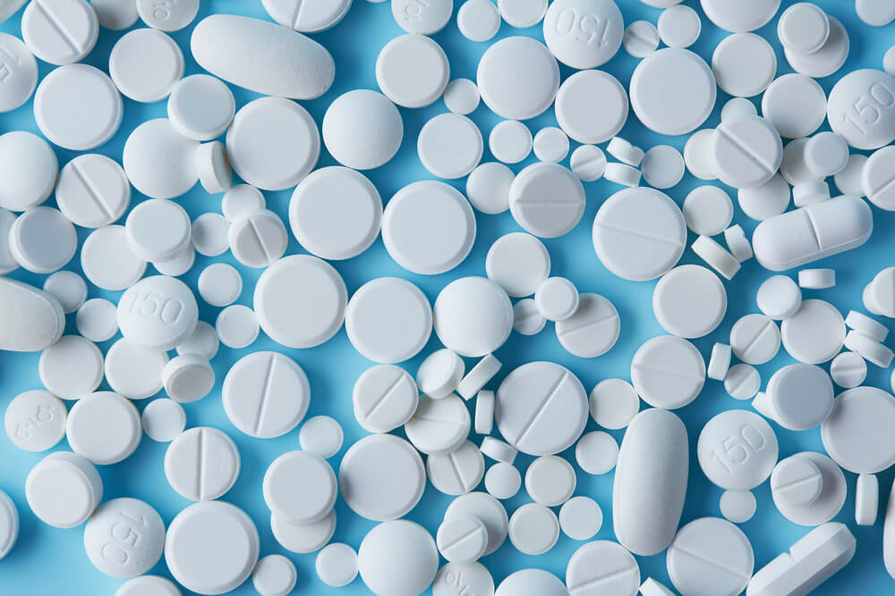 white assortment of pills