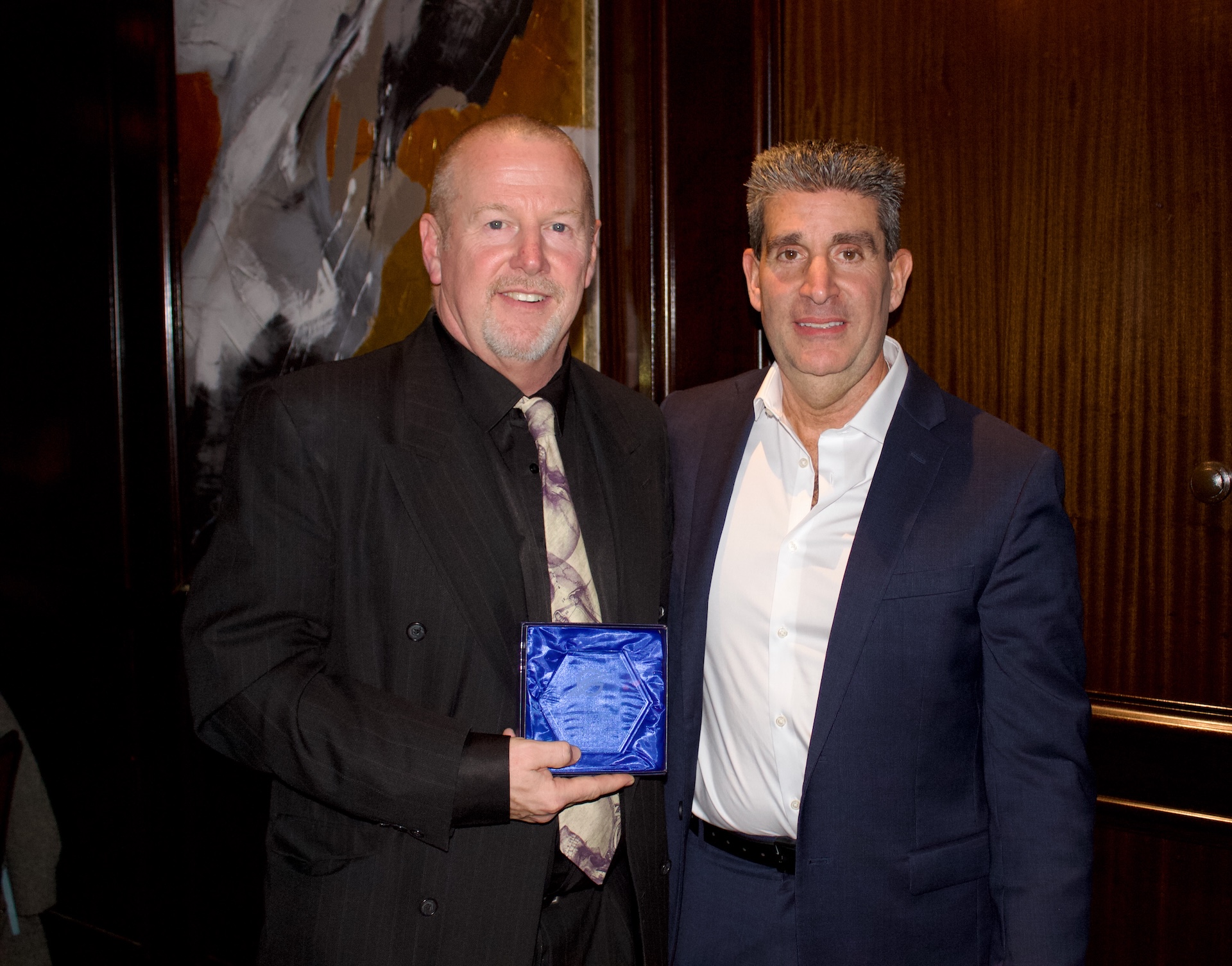 Corey Grier, 2025 MArtin J. Walsh Alumni Award Winner, and Gosnold's President and CEO, Richard Curcuru