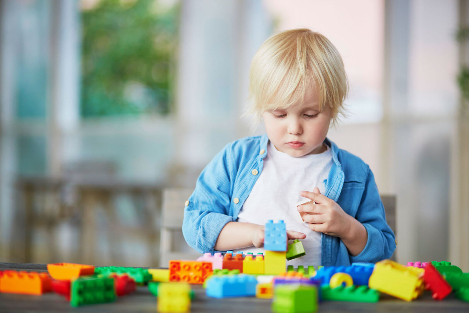 a child solving a puzzle for the Autism Diagnostic Evaluations