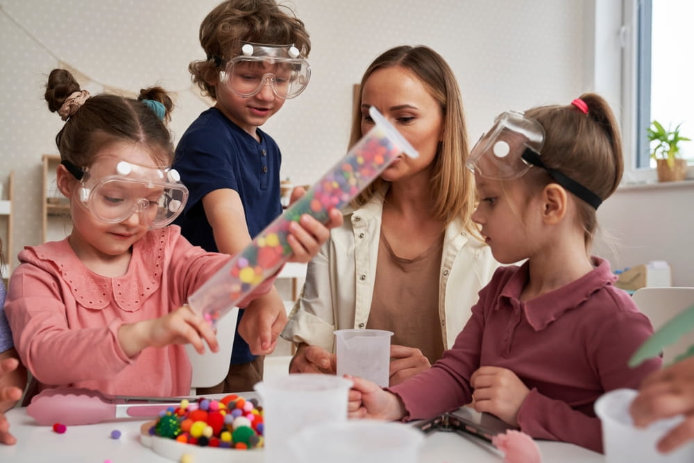 Children in lab glasses having sensory exercises