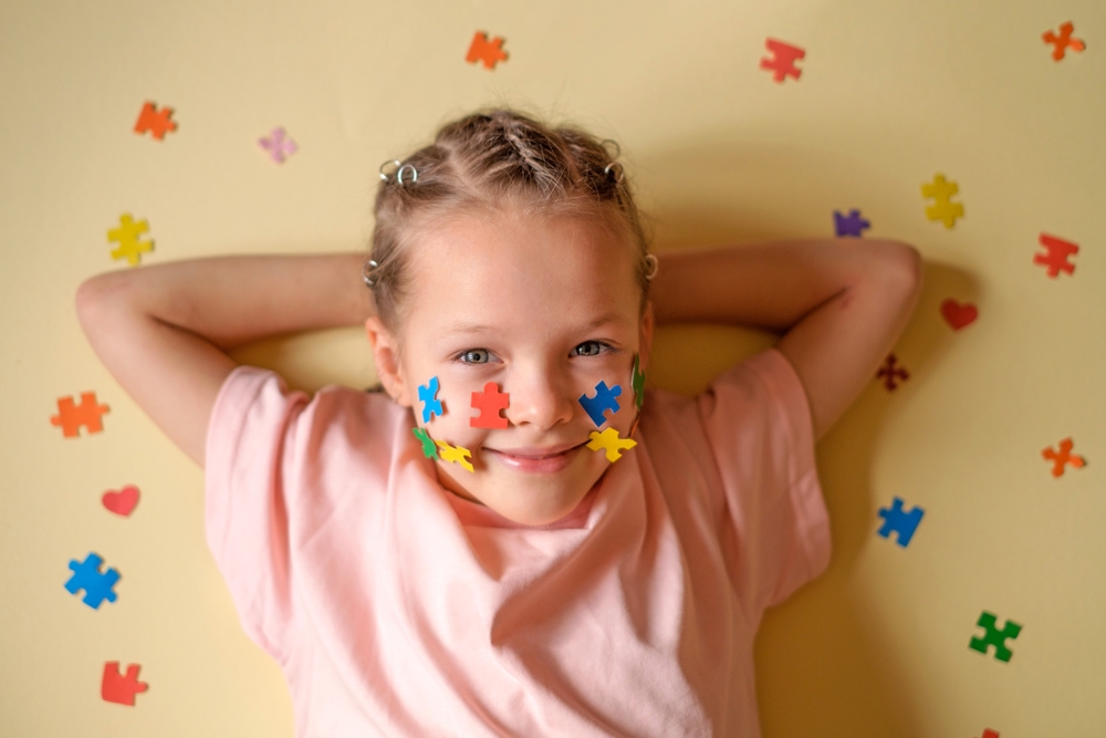child with autism smiling